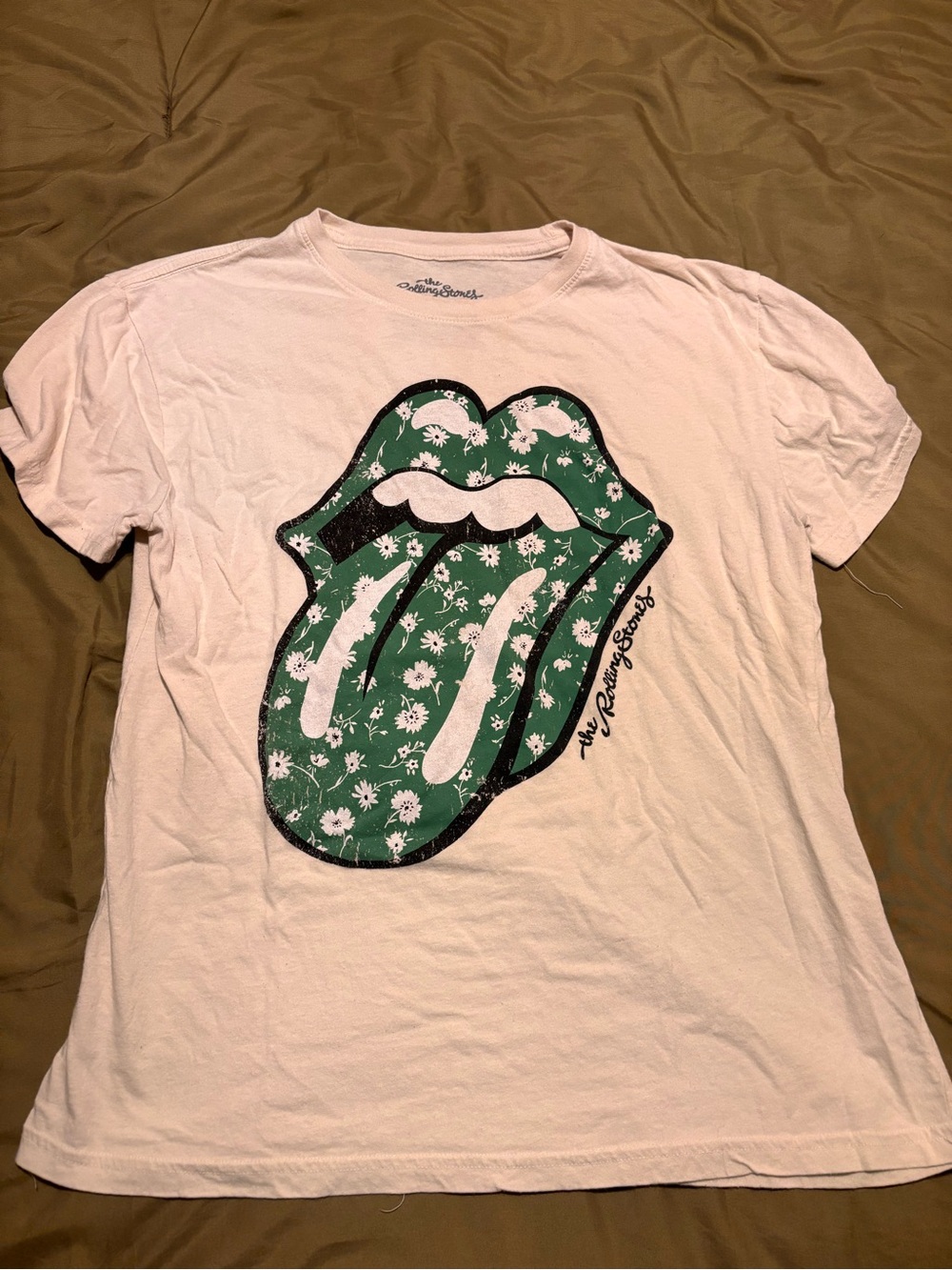 the Rolling Stones Light Pink Tee with Green Graphic Accents